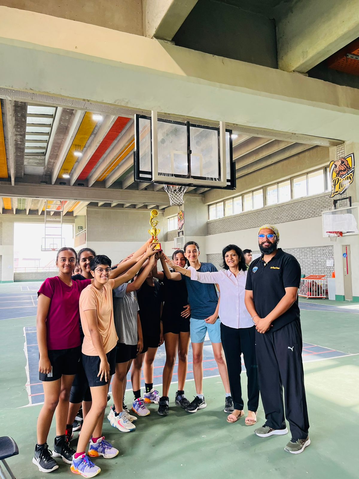Golden Victory: Shiv Nadar School FBD girls' team shines in district championship.